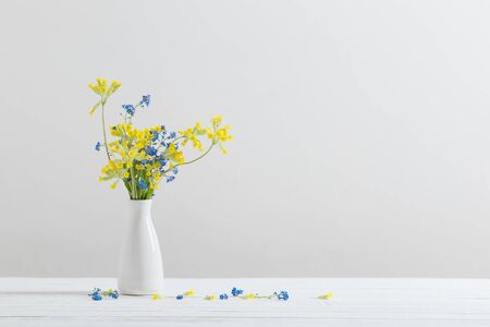 wild flowers in vase on white backgroundの写真素材