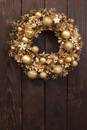 Christmas wreath on old wooden backgroundの写真素材
