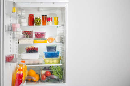 refrigerator with different healthy foodの写真素材