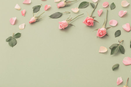 pink and white flowers on green paper background