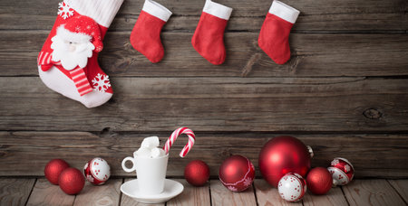 Christmas red and white decor on old wooden backgroundの写真素材