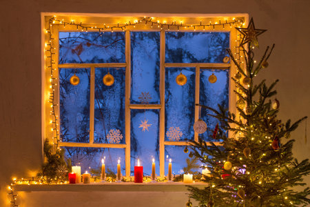 Christmas decorations on old wooden windowの写真素材