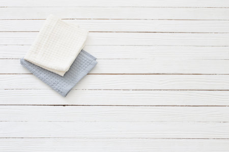 cloth napkins on white wooden tableの写真素材
