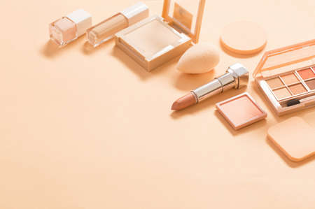nude decorative cosmetics on paper backgroundの写真素材