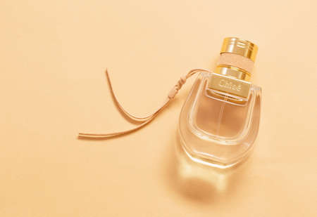 Krichev, Belarus-03.03.2021: Chloe - Nomade Eau de Parfum bottle on orange backgroundのeditorial素材