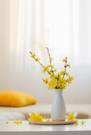spring flowers in vase on modern interiorの写真素材