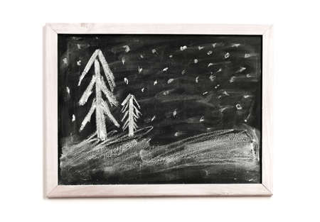 Christmas children chalk drawing on black chalkboardの写真素材