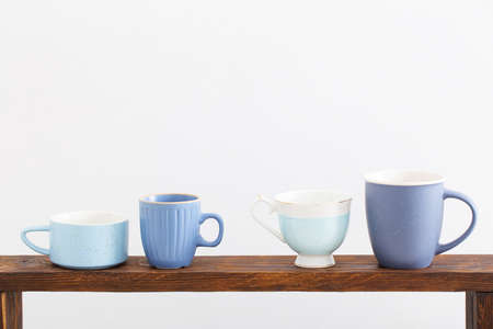 blue cups on white backgroundの写真素材