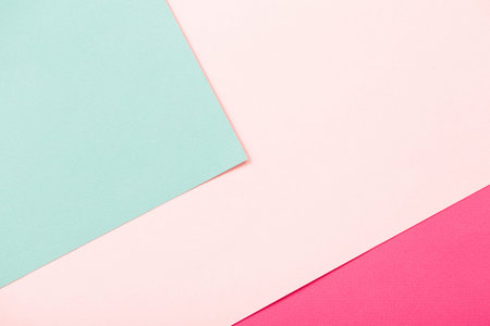 colorful pink and green cardboard background