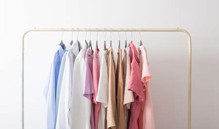 female summer wardrobe in white roomの写真素材