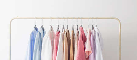 female summer wardrobe in white roomの写真素材