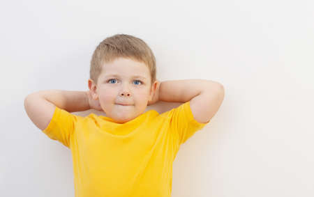 beautiful smile little boy on white backgroundの写真素材