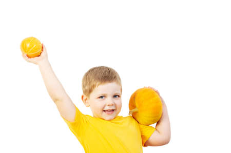 funny boy with pumpkin isolated on white backgroundの写真素材