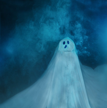funny ghost on dark blue backgroundの写真素材