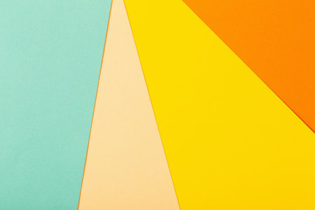 multi-colored paper background from several sheets of cardboardの写真素材