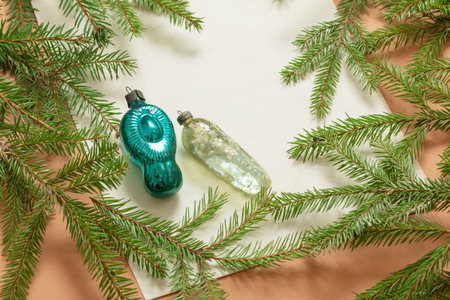 vintage christmas background with fir branches and old retro toysの写真素材