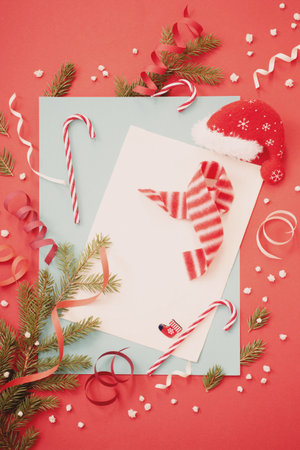 vintage paper background with green and red decorの写真素材