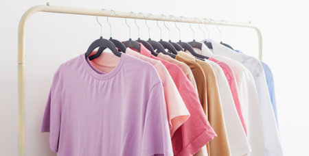 female summer wardrobe in white roomの写真素材