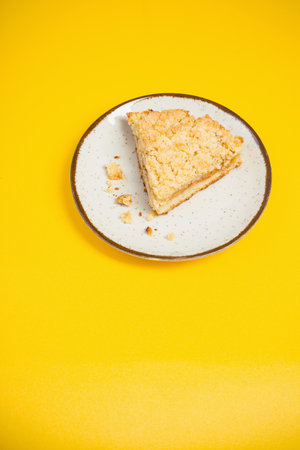 fruity shortcrust pastry pie on yellow backgroundの写真素材