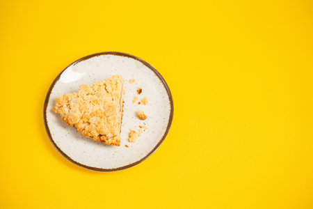 fruity shortcrust pastry pie on yellow backgroundの写真素材