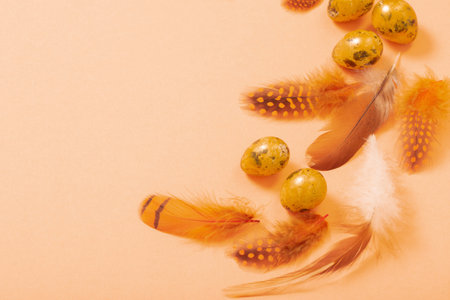 easter golden quail eggs on pastel backgroundの写真素材