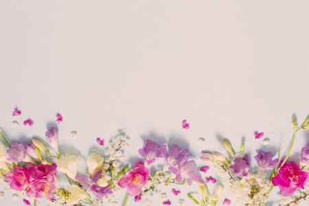 spring beautiful flowers on yellow backgroundの写真素材