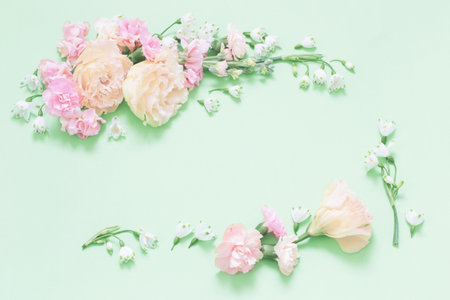 beautiful spring flowers on green backgroundの写真素材