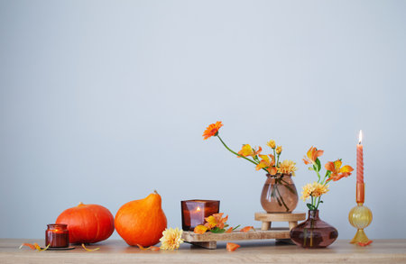 autumn still life on wooden shelf on background wallの写真素材