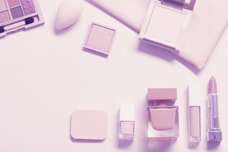 decorative cosmetics with perfume on pastel backgroundの写真素材