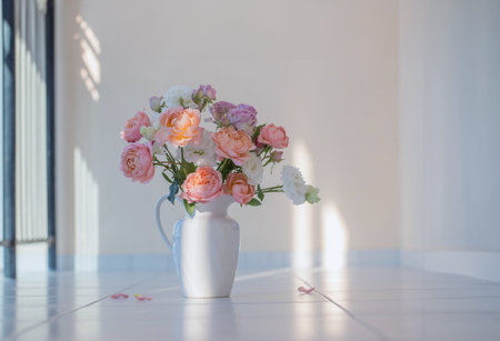 beautiful roses in ceramic white jug