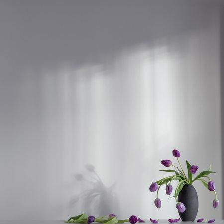 purple tulips on white shelf on background wallの写真素材