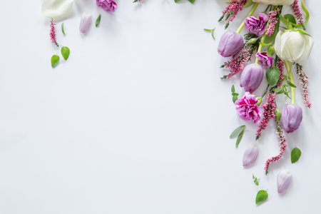 frame of beautiful flowers on white backgroundの写真素材