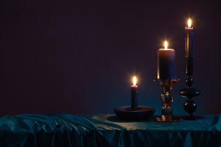 burning candles on dark backgroundの写真素材