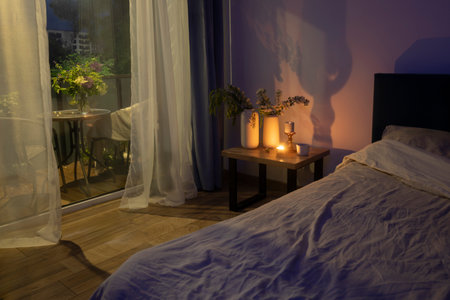 cozy beautiful decorations in night bedroomの写真素材