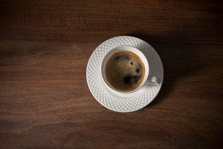 cup of coffee on wooden tableの写真素材
