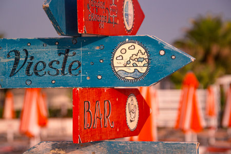 signpost at spiaggia di castello beach in Vieste, Gargano, Apulia, Italyの写真素材