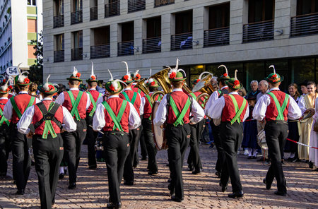 Meran, South Tyrol, Italy - 15 October 2023 Traditional parade of music bands at grape festival