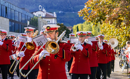 Meran, South Tyrol, Italy - 15 October 2023 Traditional parade of music bands at grape festival