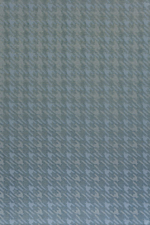 Flat woven background with a broken check pattern. Dark blue-gray base is complemented by light gray...