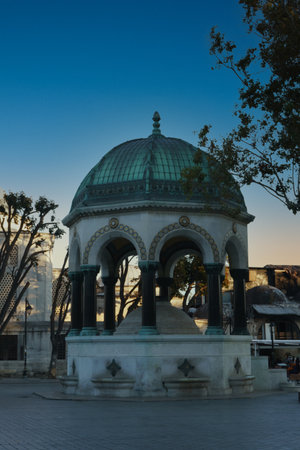 German Fountain in Sultanahmet, Istanbul at Twilight â Ornate Neo-Byzantine Architecture with Green Dome and Archesの写真素材