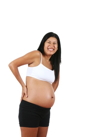 Pregnant Peruvian woman, posing, isolated on white backgroundの写真素材