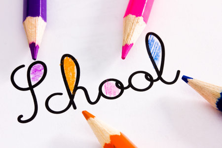 School word colored with pencils