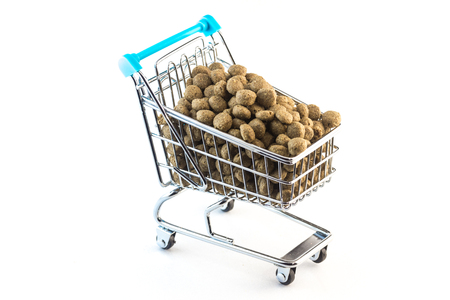 Cart fulfilled with pet food - pet nutrition conceptの写真素材