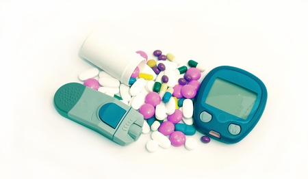 Device for measuring blood sugar level and pills の写真素材