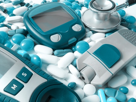 Device for measuring blood sugar level and pillsの写真素材