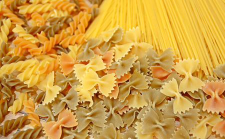 Variety of types and shapes of Italian pasta. Dry pasta backgroundの写真素材