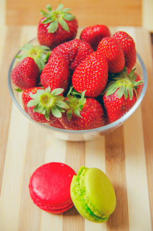Macaroons, strawberriesの写真素材