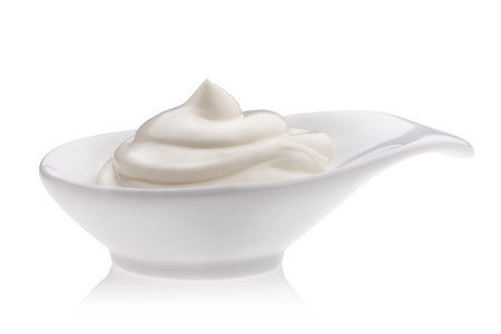 white cream or yogurt on white backgroundの写真素材