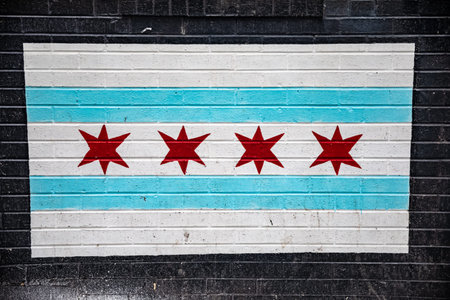 Chicago Illinois flag with blue and white stripes and red stars painted on black brick with natural...
