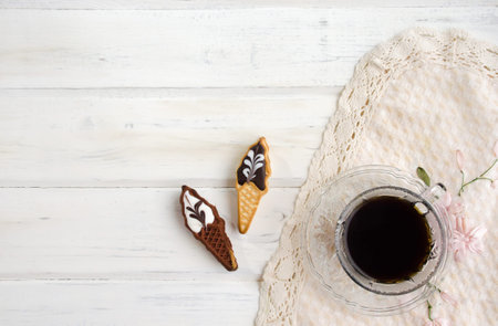 Cup of coffee with cookies. on white wooden board. Selective focus.
